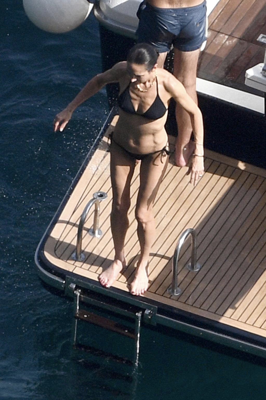 Jennifer Connelly stuns in a black bikini while relaxing on a